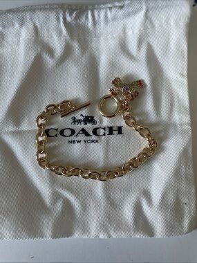 Coach Gold-Tone Chain Bracelet with Multicolor Bow Charm